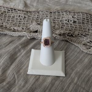 Elegant Rose Gold and Purple Gemstone Ring